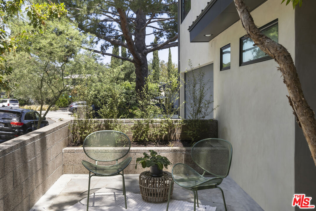 1508 Elevado Street Los Angeles, CA 90026 - Photo 2 of 50 a vase of flowers sitting on a table