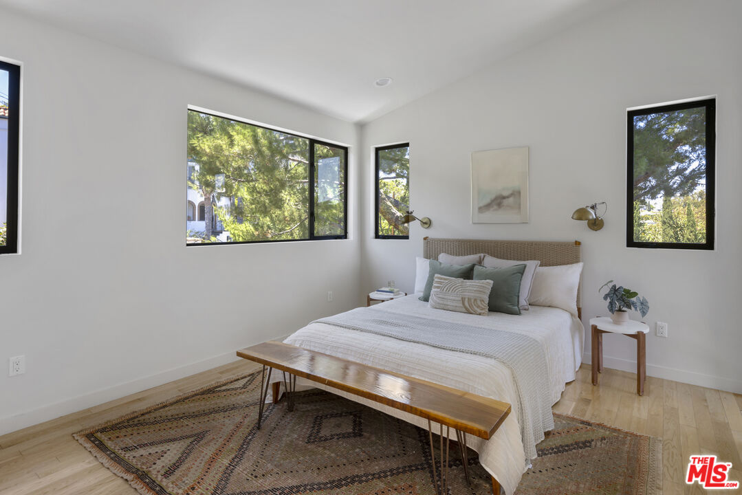 1508 Elevado Street Los Angeles, CA 90026 - Photo 26 of 50 a bedroom with a bed and a window