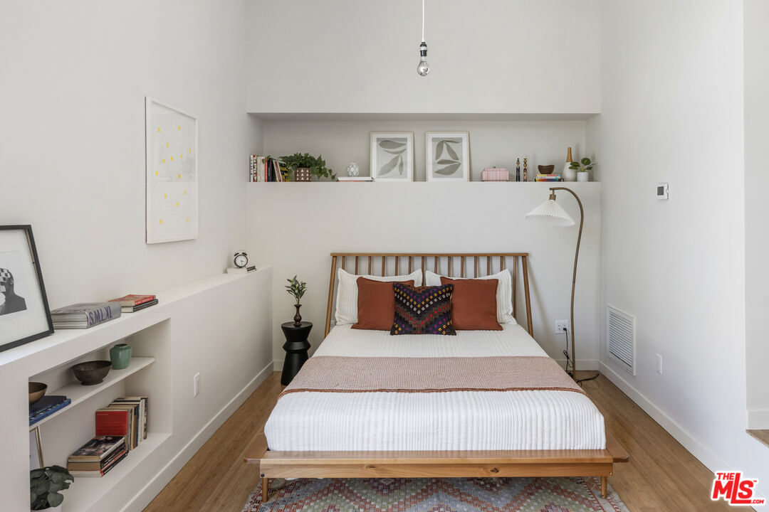 1508 Elevado Street Los Angeles, CA 90026 - Photo 41 of 50 a bedroom with a bed and a window