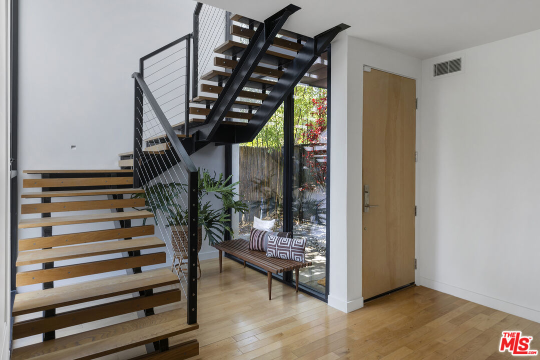 1508 Elevado Street Los Angeles, CA 90026 - Photo 6 of 50 a view of entryway and hall with wooden floor