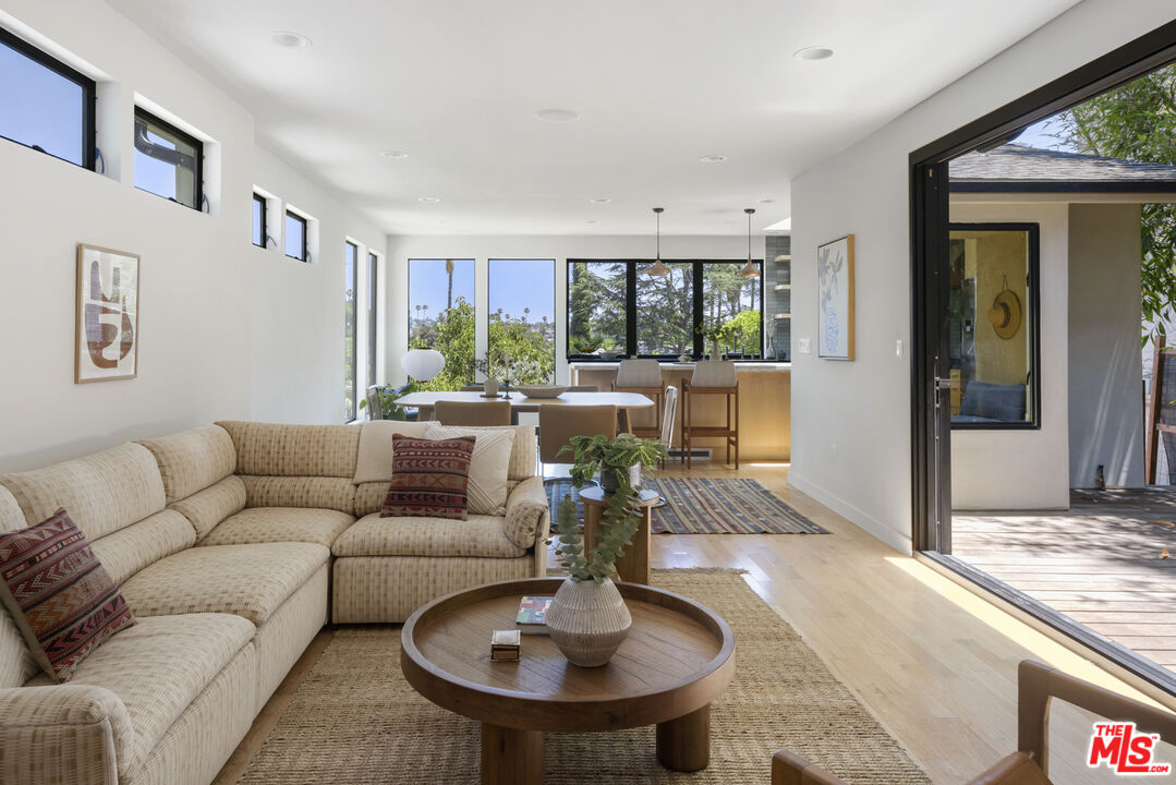 1508 Elevado Street Los Angeles, CA 90026 - Photo 10 of 50 a living room with furniture and a table