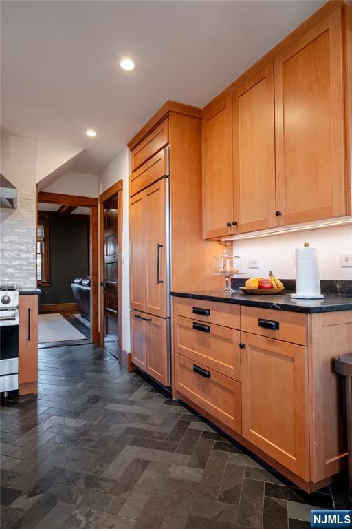 36 Clarendon Place Bloomfield, NJ 07003 - Photo 22 of 48 a kitchen with stainless steel appliances granite countertop a refrigerator and a stove top oven