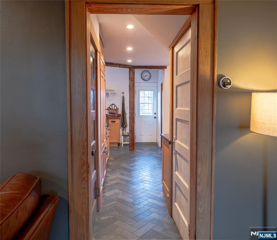 36 Clarendon Place Bloomfield, NJ 07003 - Photo 23 of 48 a view of hallway with wooden floor and furniture