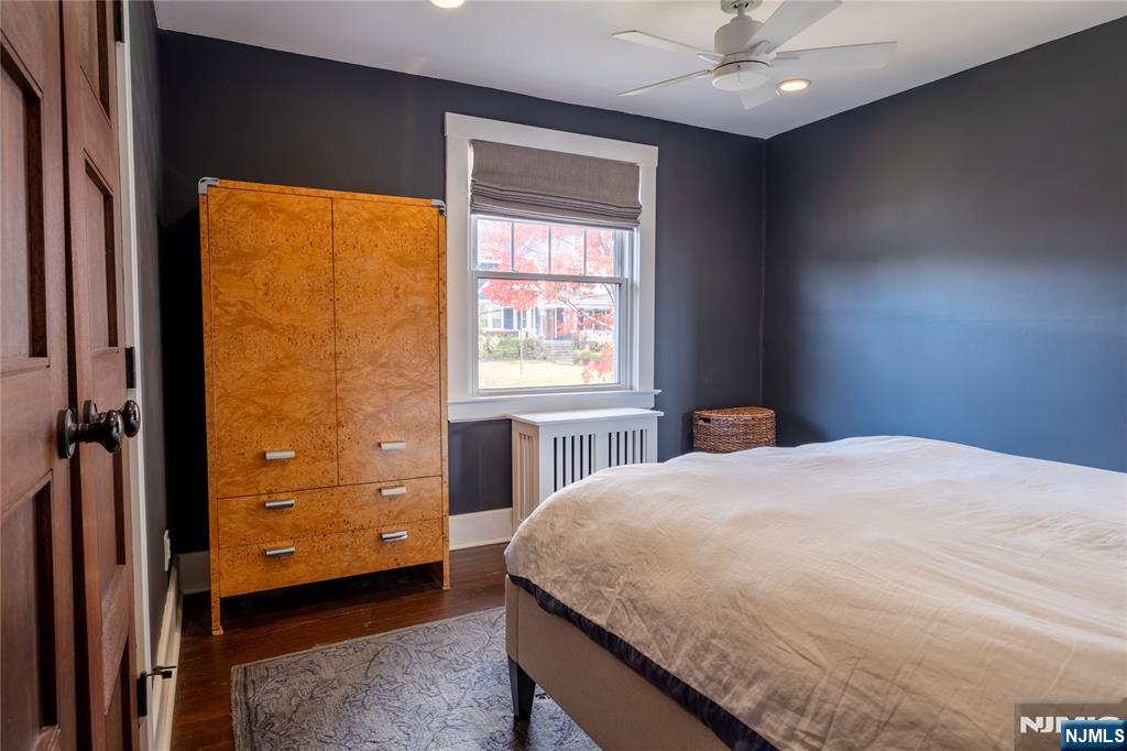 36 Clarendon Place Bloomfield, NJ 07003 - Photo 26 of 48 a bedroom with a bed and a window