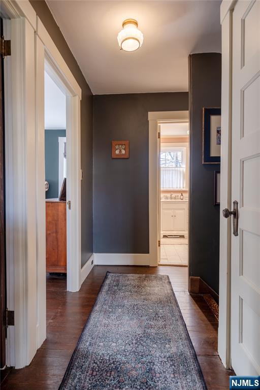 36 Clarendon Place Bloomfield, NJ 07003 - Photo 34 of 48 a view of hallway with wooden floor
