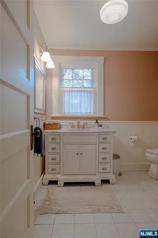 a view of a stove with cabinet