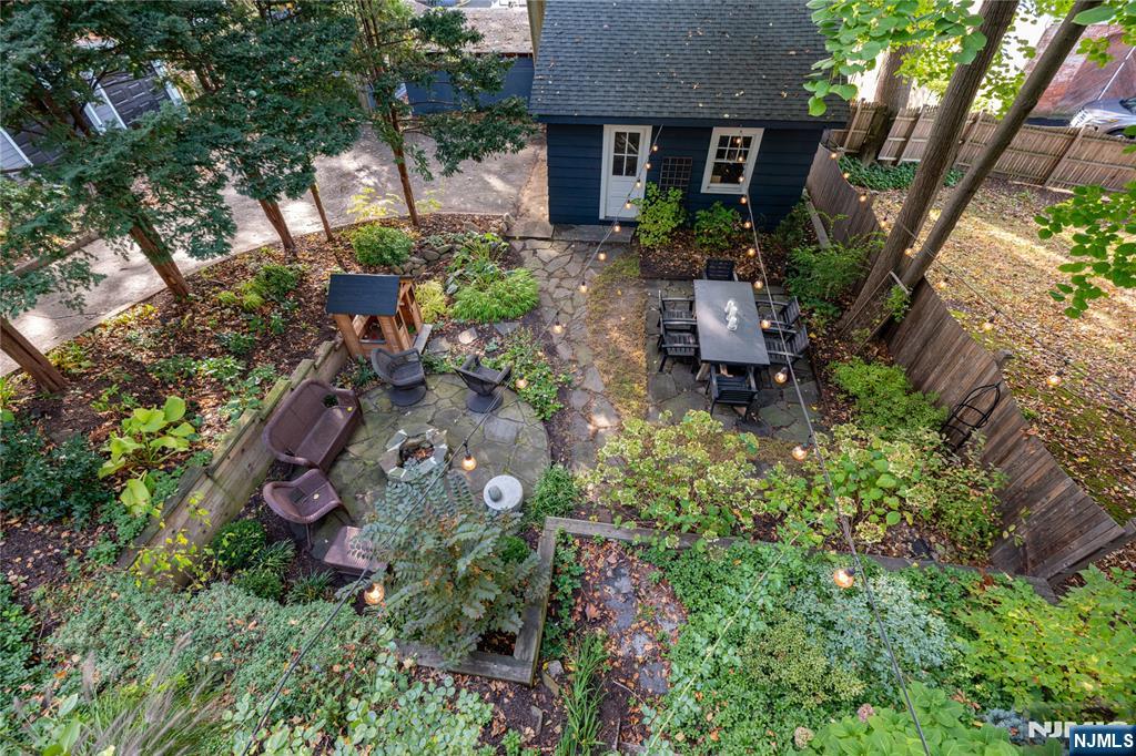 36 Clarendon Place Bloomfield, NJ 07003 - Photo 45 of 48 a backyard of a house with outdoor seating
