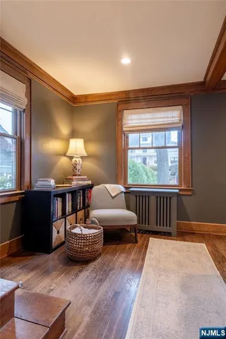 a spacious bedroom with a bed and a window