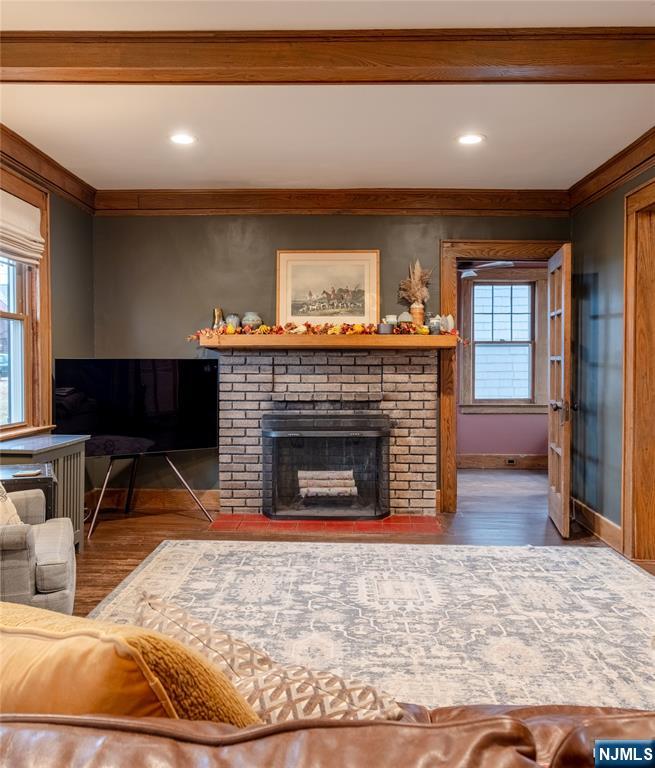 36 Clarendon Place Bloomfield, NJ 07003 - Photo 7 of 48 a living room with furniture and a fireplace