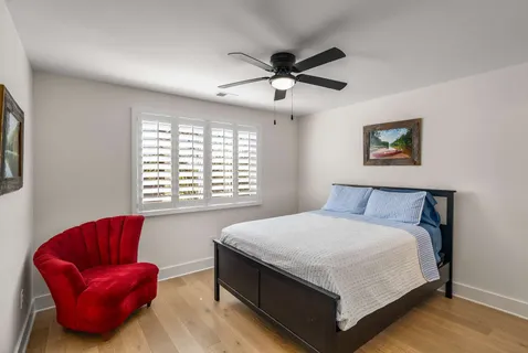 a view of a pathway with a yard