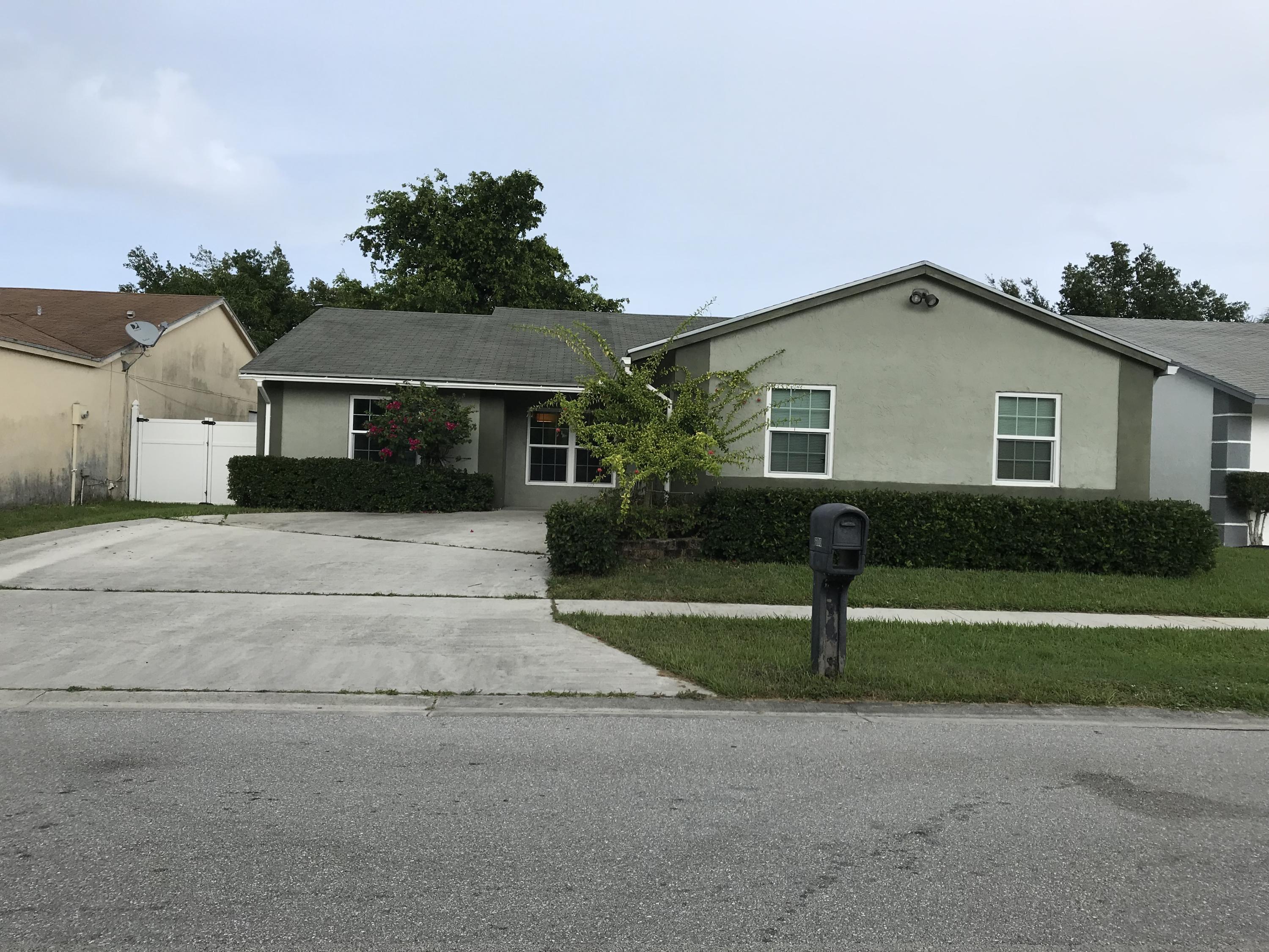6000 Triphammer Road Lake Worth, FL 33463 - Photo 1 of 20 Front