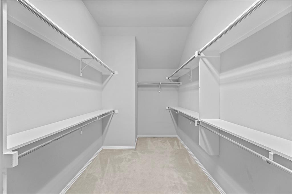 2405 Reston Drive McKinney, TX 75072 - Photo 25 of 38 Walk in closet with light colored carpet