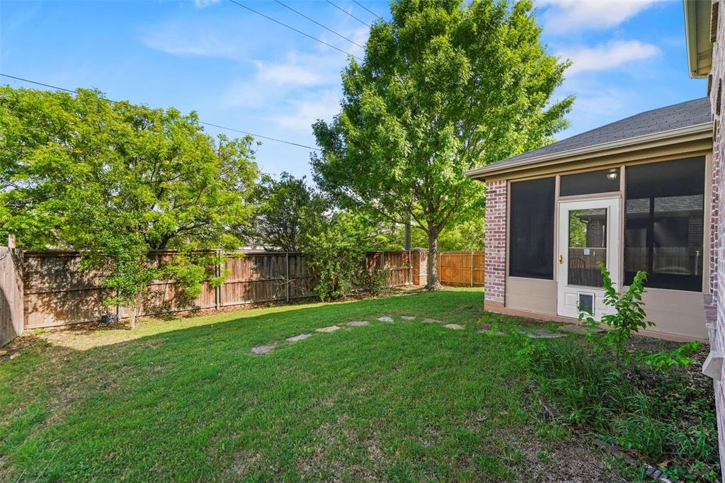 2405 Reston Drive McKinney, TX 75072 - Photo 33 of 38 Fenced backyard featuring a sunroom