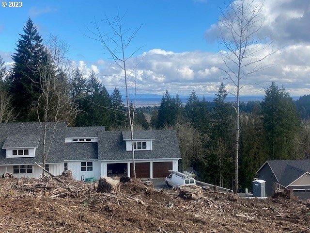 Hawthorne, Unit 9 Scappoose, OR 97056 - Photo 3 of 5 a view of a house with a yard