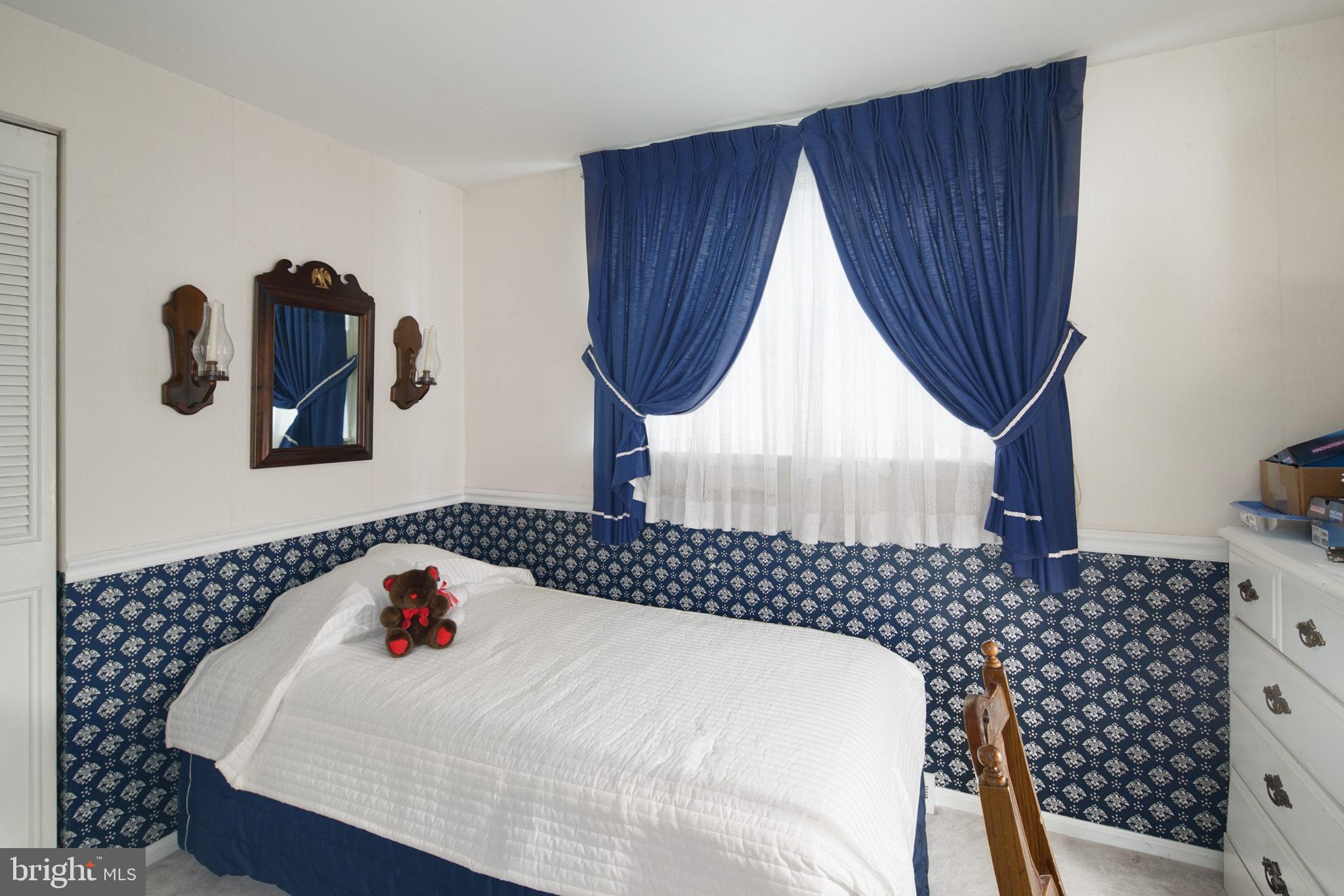 13 Madison Drive Clementon, NJ 08021 - Photo 15 of 36 a bathroom with a sink and a mirror