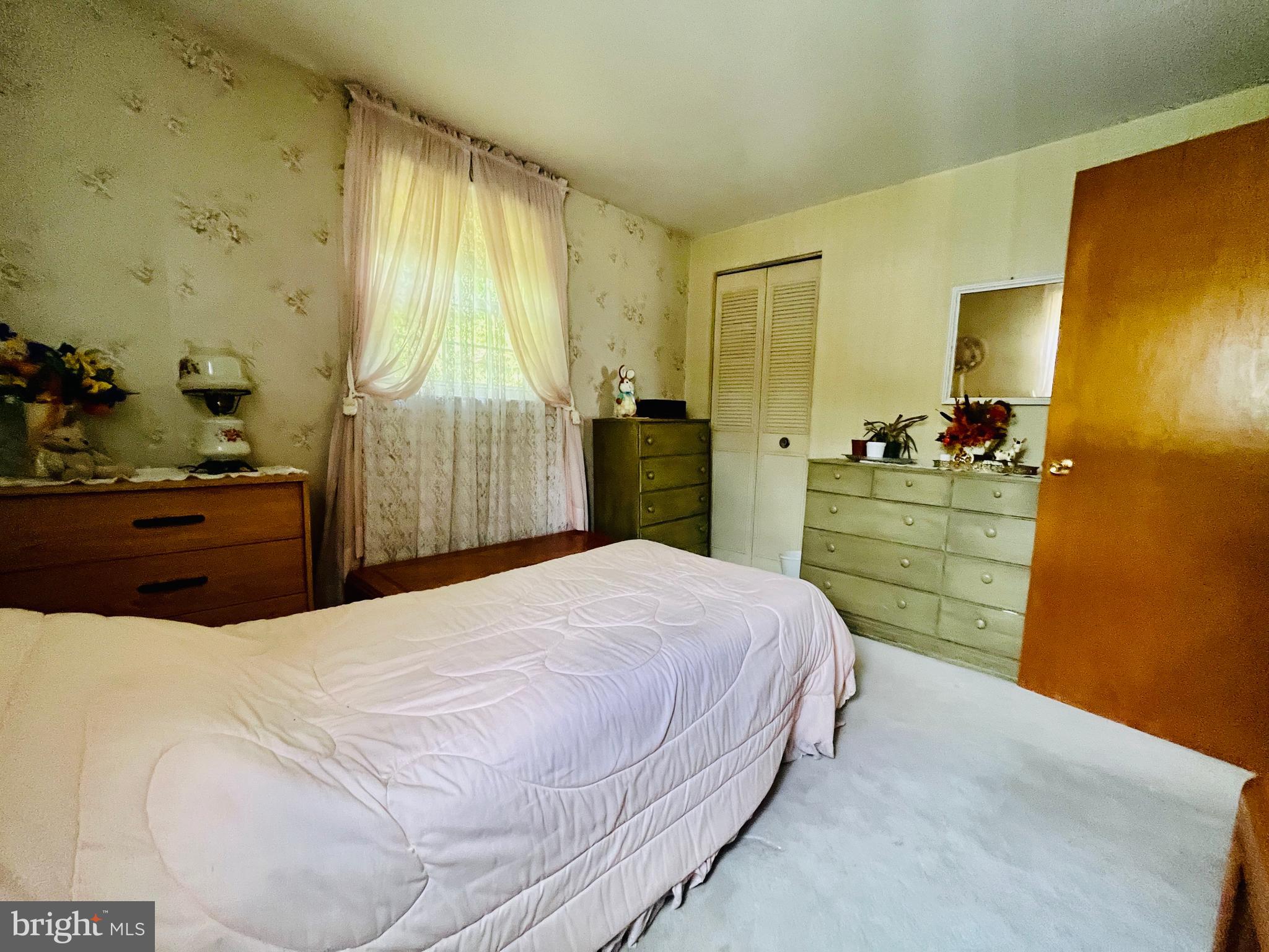 13 Madison Drive Clementon, NJ 08021 - Photo 19 of 36 a bedroom with a bed and dresser