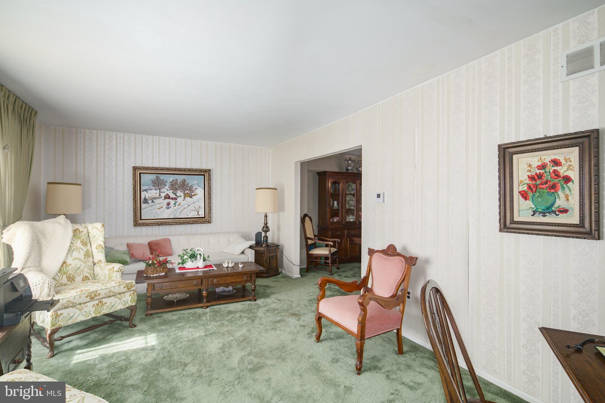 13 Madison Drive Clementon, NJ 08021 - Photo 6 of 36 a living room with furniture and a rug