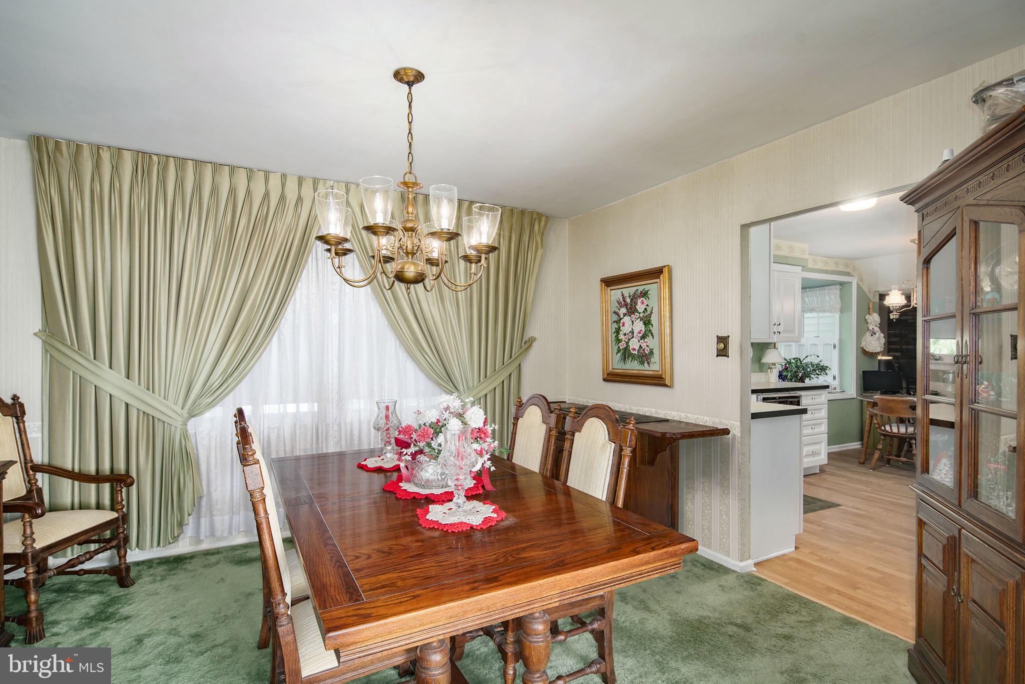 13 Madison Drive Clementon, NJ 08021 - Photo 7 of 36 a view of a dining room with furniture window and wooden floor