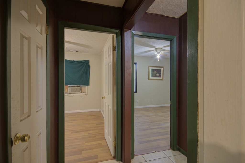 92 No-Where Road Blairsville, GA 30512 - Photo 20 of 36 a view of a bathroom from a hallway