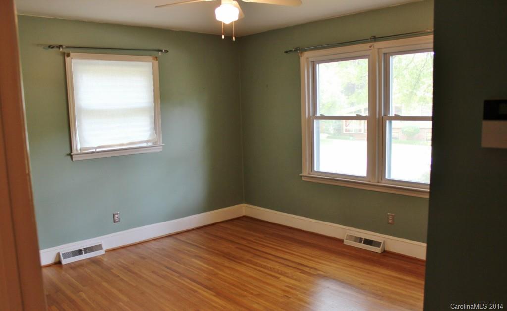 1510 Burnley Road Charlotte, NC 28210 - Photo 17 of 19 a view of a room with wooden floor and windows