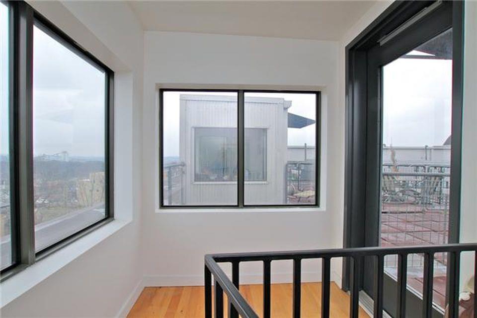 1400 Rosa L Parks Boulevard, Unit 323 Nashville, TN 37208 - Photo 22 of 25 a view of a door and wooden floor