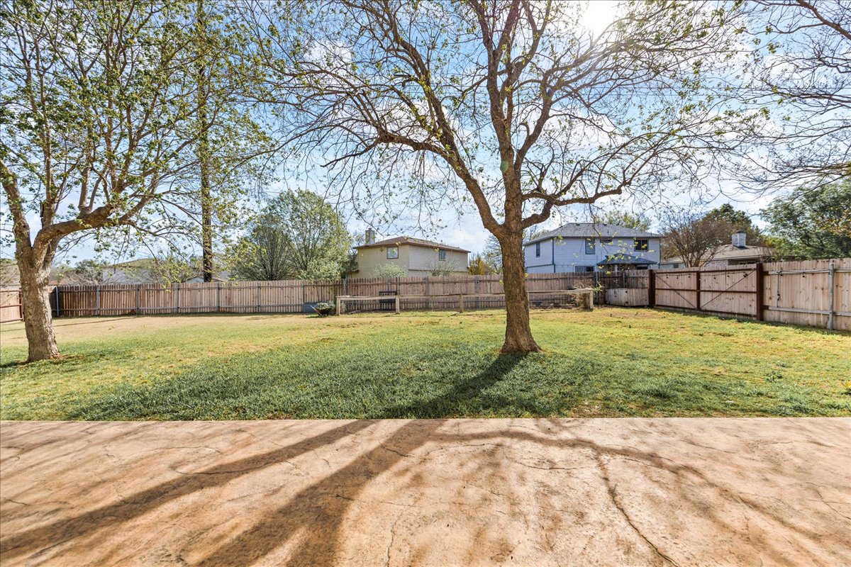 116 Devon's Cove Buda, TX 78610 - Photo 6 of 38 View of fenced backyard