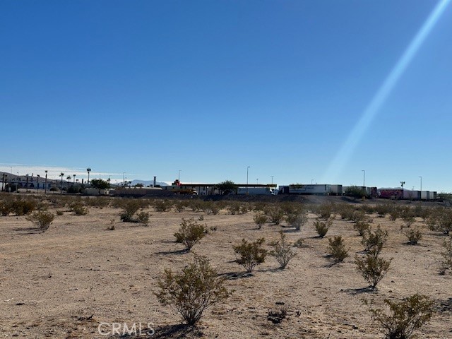 0 Lenwood Road Barstow, CA 92311 - Photo 6 of 12 a view of lake with boats and trees in the background