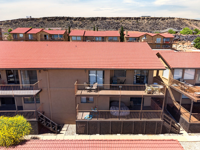 161 West 950 South, Unit Q1 St. George, UT 84770 - Photo 34 of 37 Rear view of house featuring a tile roof and stairway