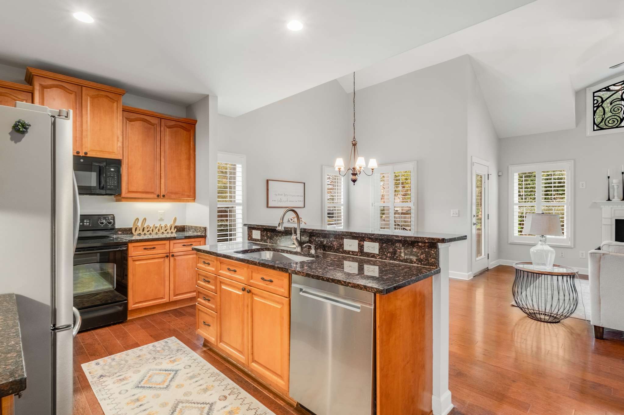 3005 Haviland Way Murfreesboro, TN 37128 - Photo 15 of 47 a kitchen with stainless steel appliances granite countertop a sink stove and refrigerator