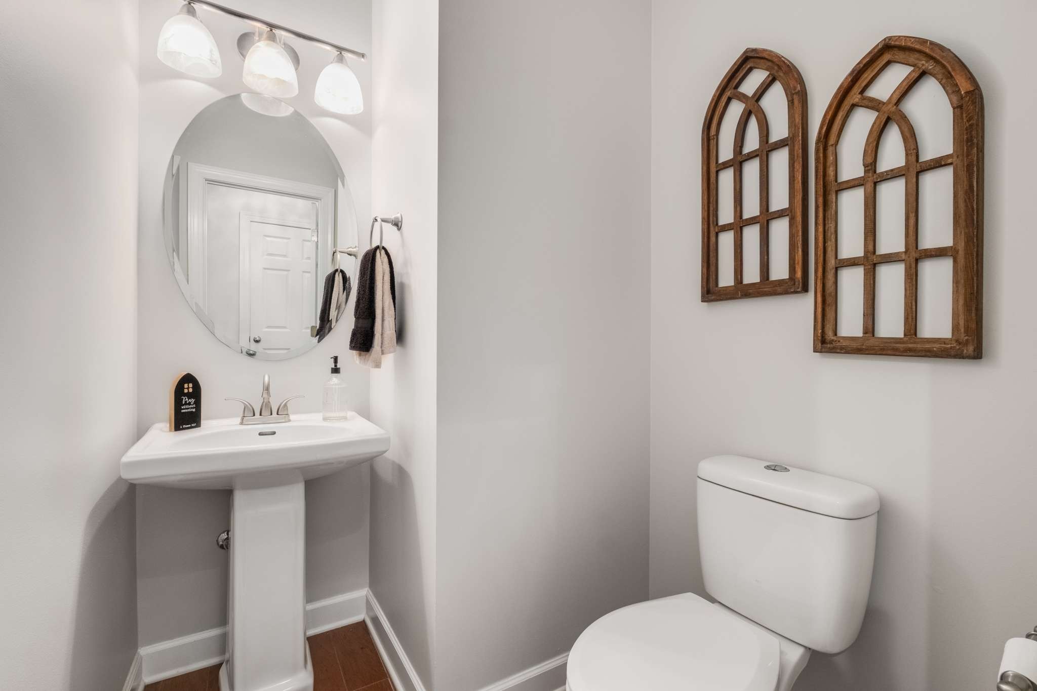 3005 Haviland Way Murfreesboro, TN 37128 - Photo 19 of 47 a bathroom with a toilet a sink and mirror