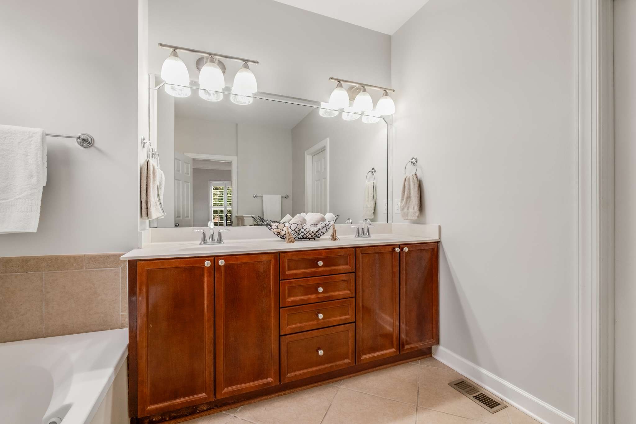 3005 Haviland Way Murfreesboro, TN 37128 - Photo 22 of 47 a bathroom with a double vanity sink and a mirror