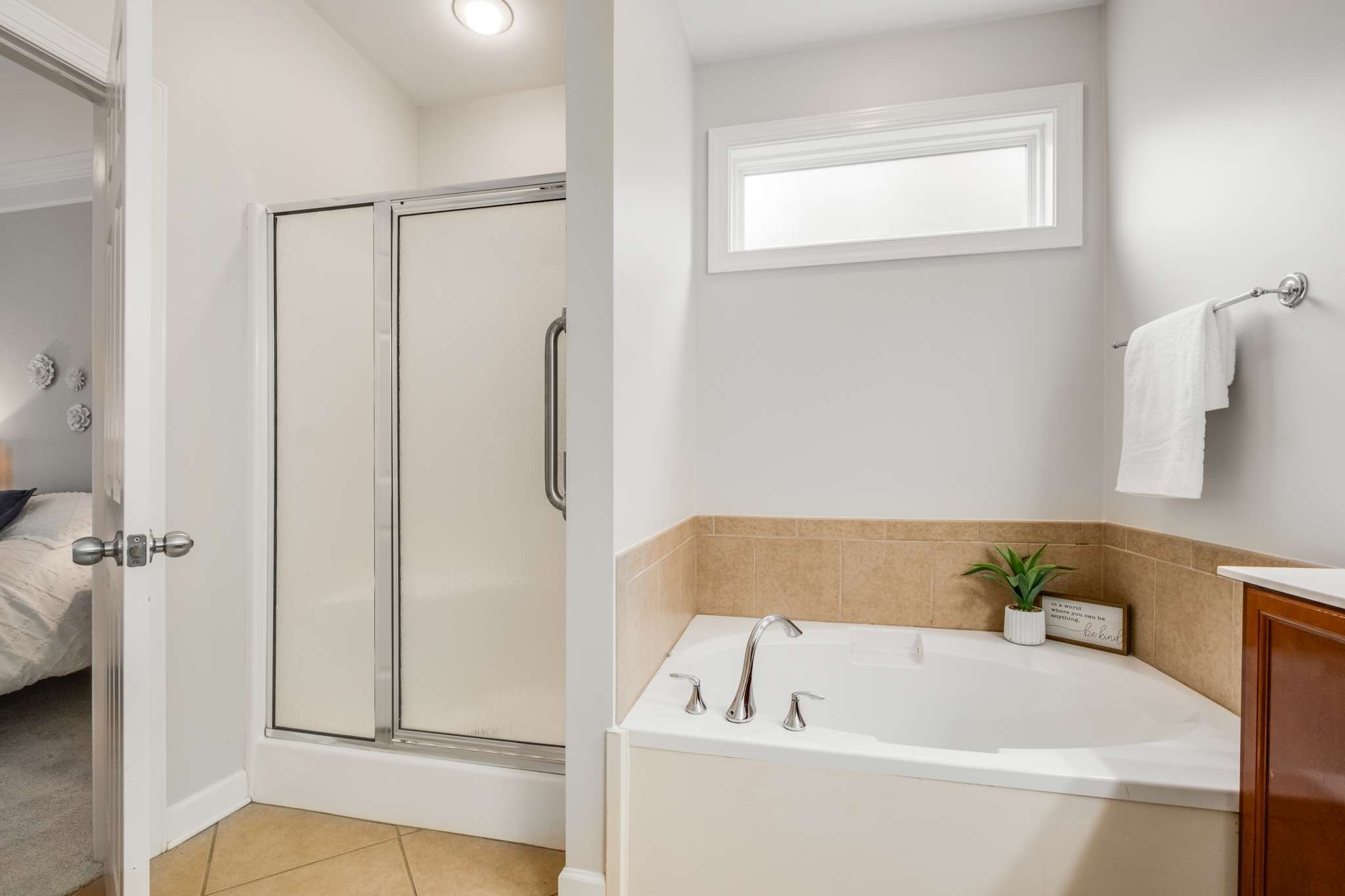 3005 Haviland Way Murfreesboro, TN 37128 - Photo 23 of 47 a bathroom with a tub and a shower