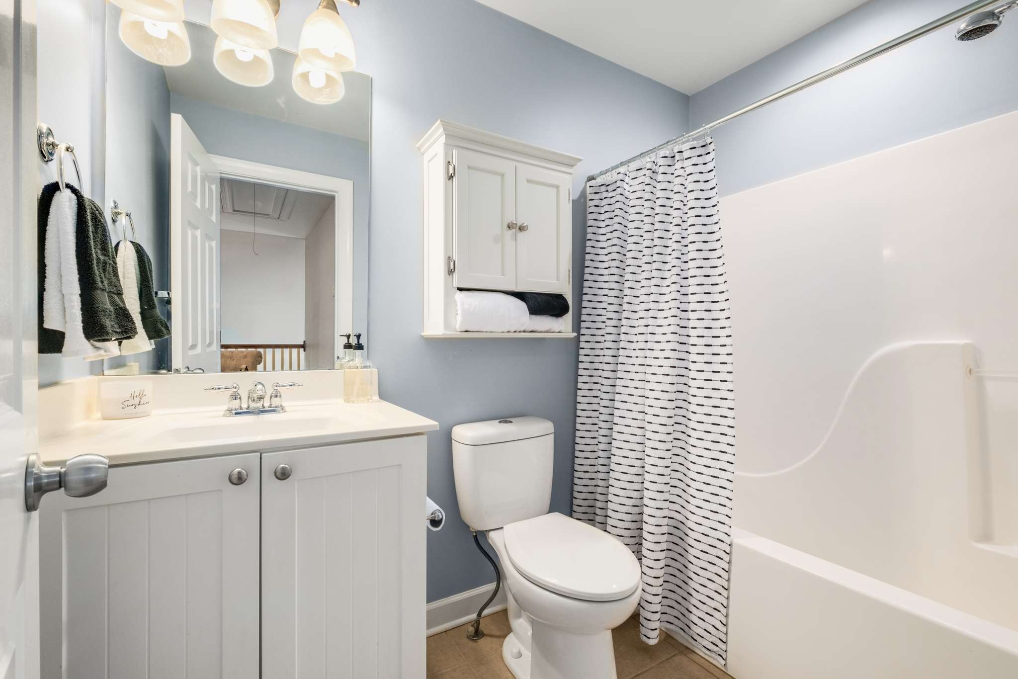 3005 Haviland Way Murfreesboro, TN 37128 - Photo 30 of 47 a bathroom with a toilet a sink and a mirror
