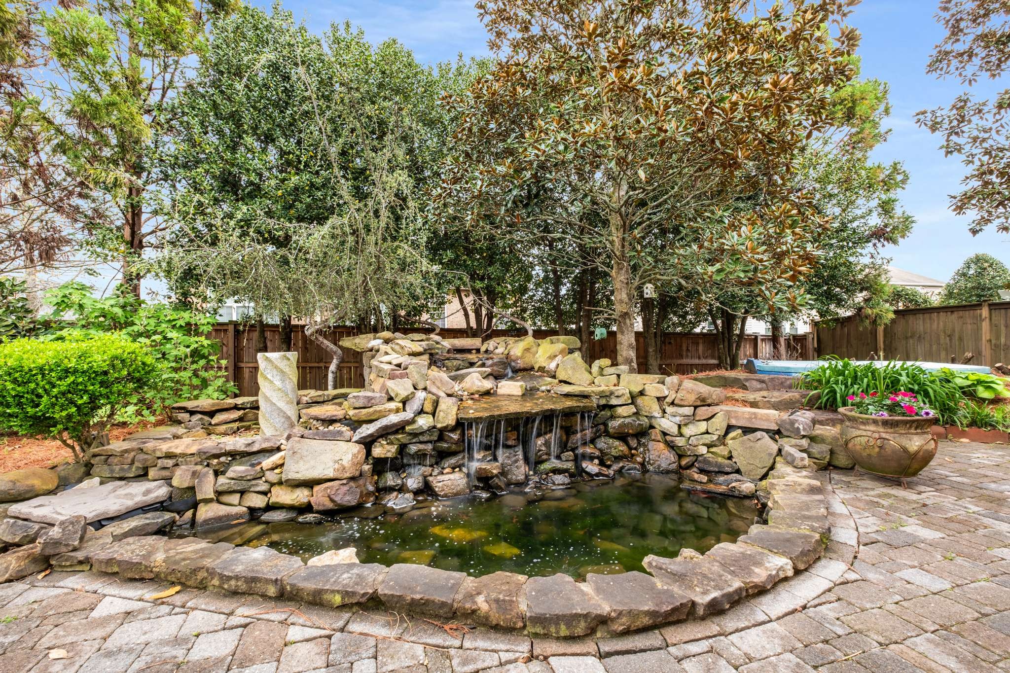 3005 Haviland Way Murfreesboro, TN 37128 - Photo 39 of 47 a view of a patio with table and chairs potted plants and large tree
