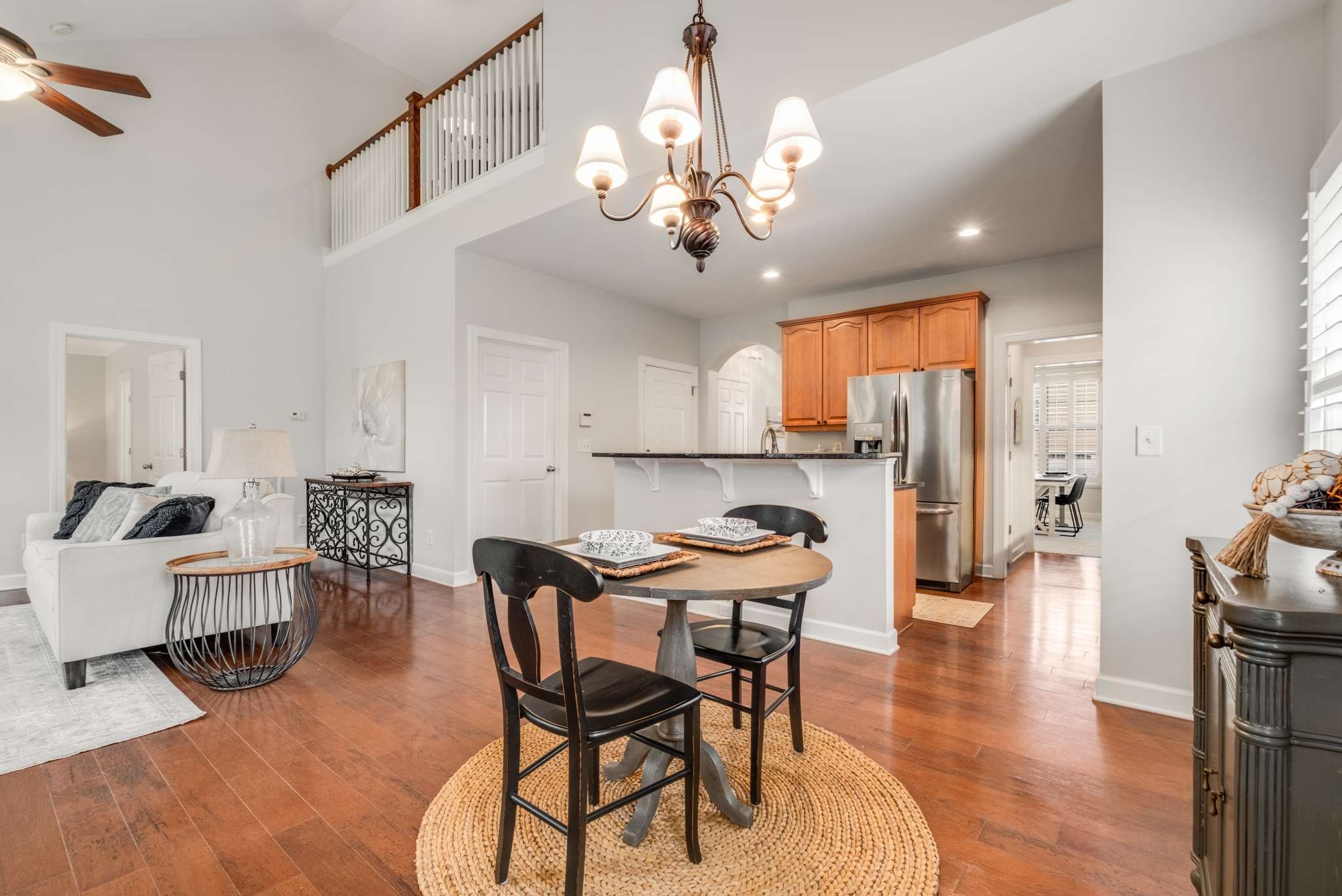 3005 Haviland Way Murfreesboro, TN 37128 - Photo 10 of 47 a view of a dining room with furniture a chandelier and wooden floor