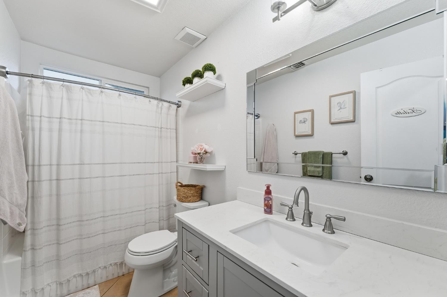 2220 Ellison Drive Modesto, CA 95355 - Photo 34 of 53 a bathroom with a sink toilet and shower
