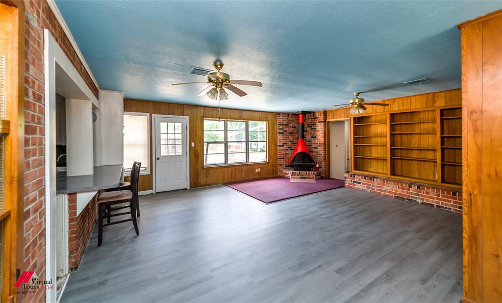 3109 Gorton Road Shreveport, LA 71119 - Photo 13 of 31 wooden floor in an empty room with a window