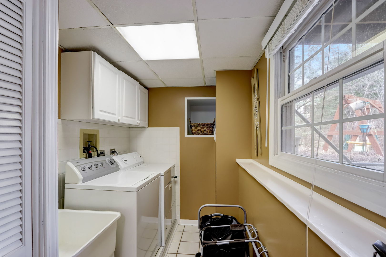 7N151 Longridge Road St. Charles, IL 60175 - Photo 26 of 46 a utility room with dryer washer and a window