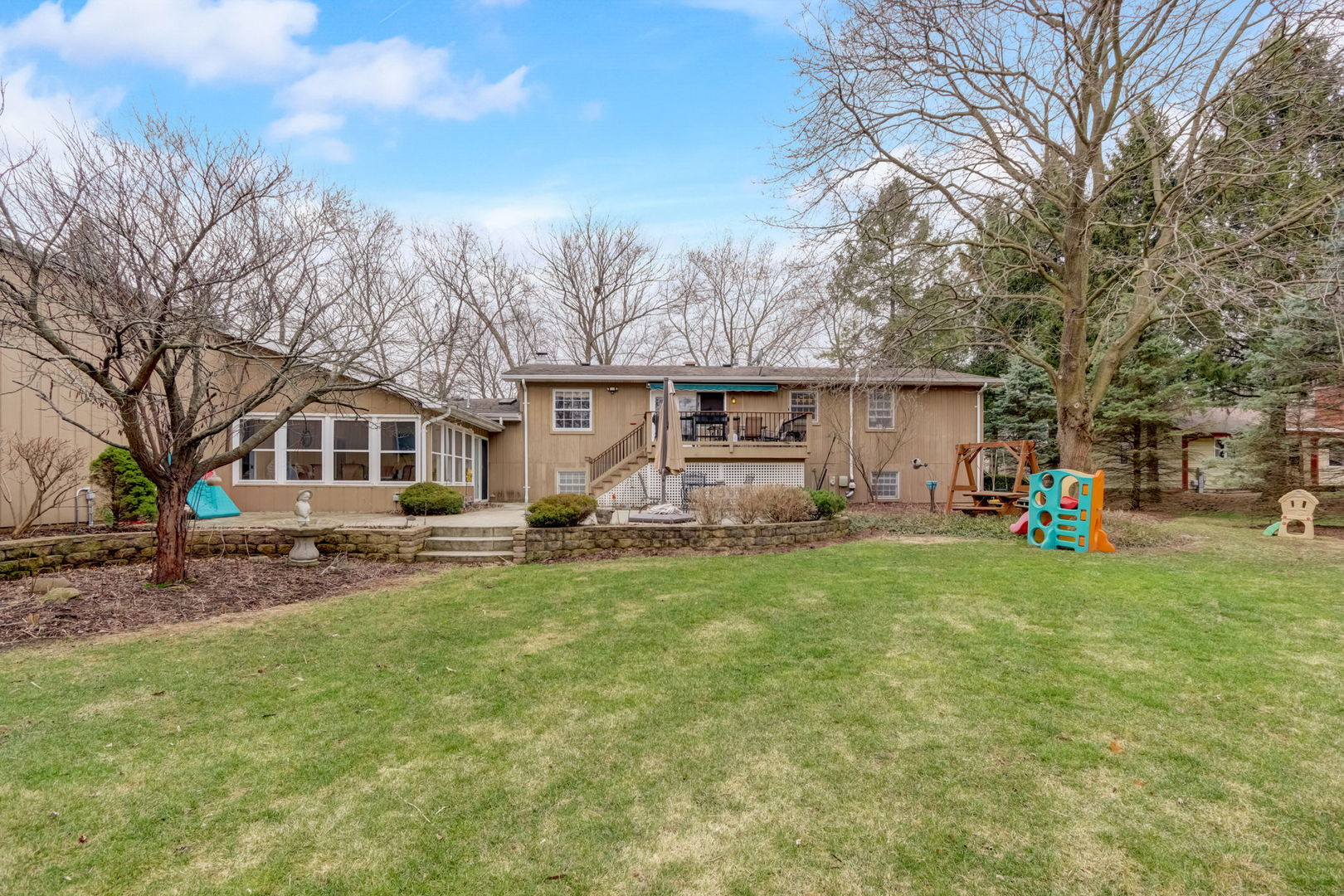 7N151 Longridge Road St. Charles, IL 60175 - Photo 42 of 46 a front view of a house with garden