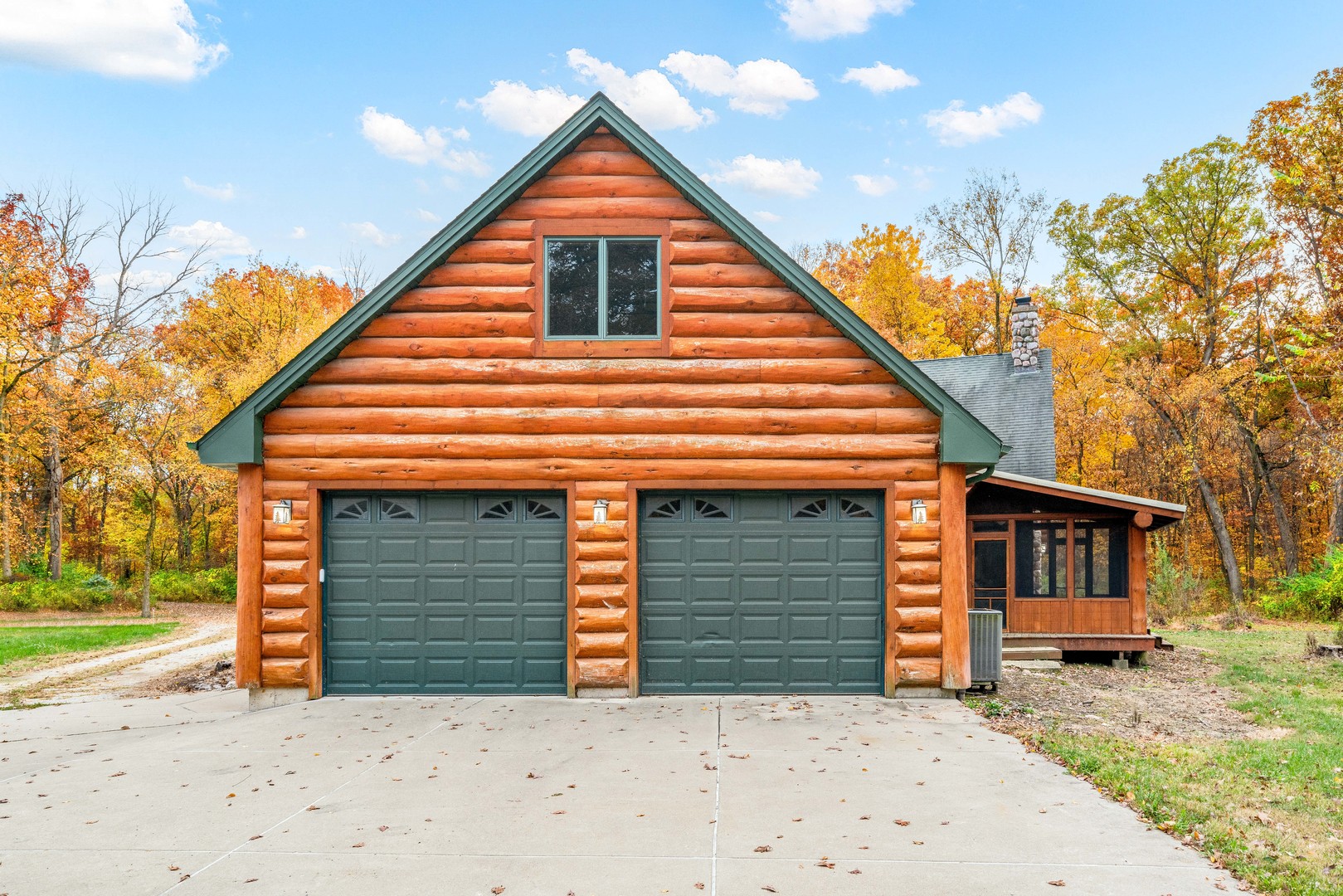 2045 North 3650th Road Serena, IL 60549 - Photo 53 of 53 a front view of a house with a yard and garage