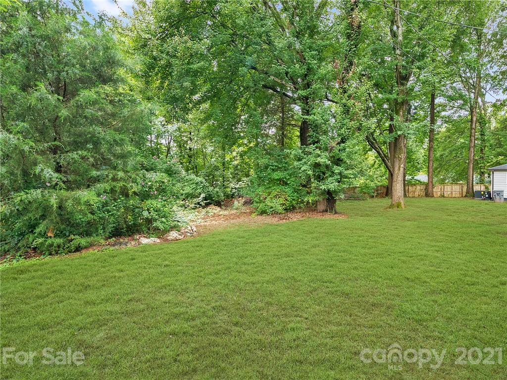 5344 Rockwood Road Charlotte, NC 28216 - Photo 7 of 31 a view of building with trees