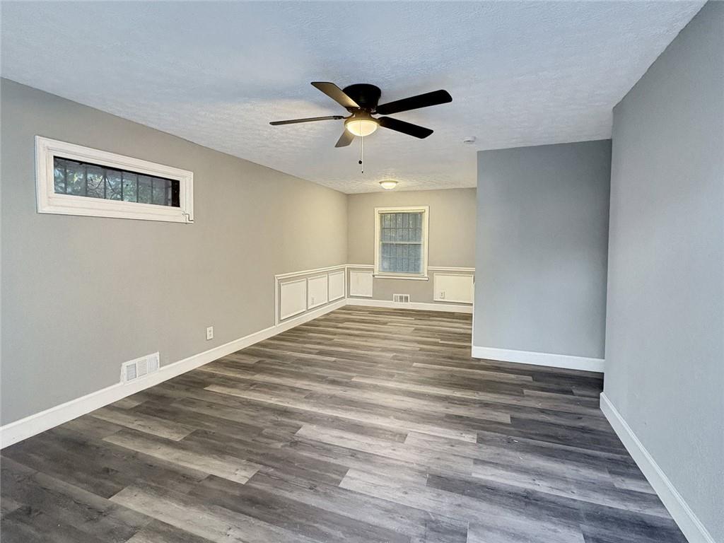 2955 Wanda Circle Southwest Atlanta, GA 30315 - Photo 2 of 10 a view of empty room with wooden floor