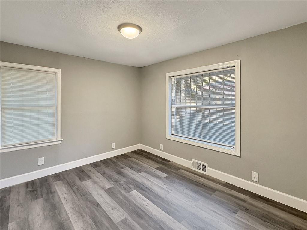 2955 Wanda Circle Southwest Atlanta, GA 30315 - Photo 9 of 10 an empty room with a window