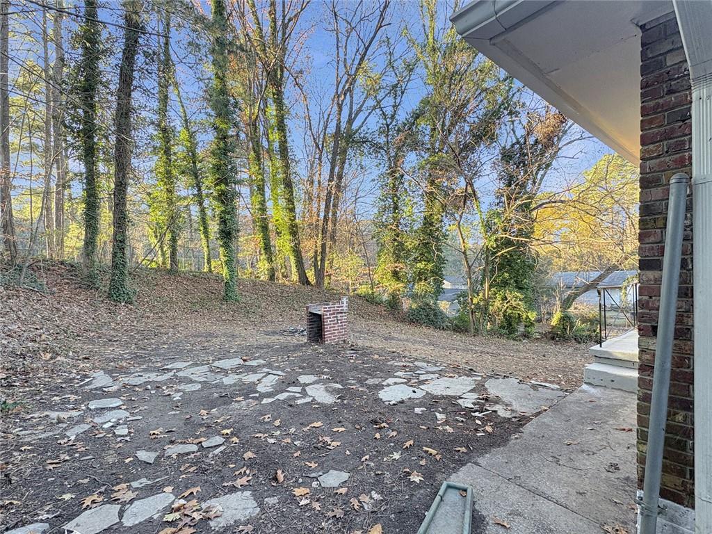 2955 Wanda Circle Southwest Atlanta, GA 30315 - Photo 10 of 10 a view of a yard with plants and trees