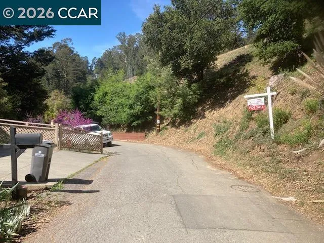 a sign that is on a brick wall