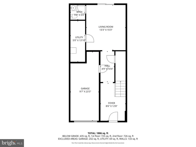 a picture of a bench in front of a wall