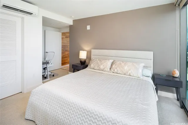 a large bed sitting in a bedroom and closet