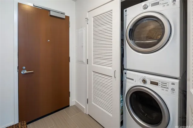 a view of a hallway with washer and dryer