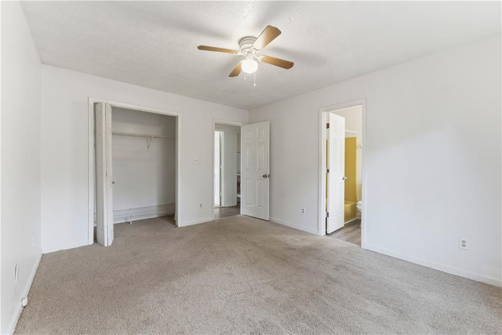 2130 Fieldstone View Court Southeast, Unit B Conyers, GA 30013 - Photo 16 of 18 a view of an empty room