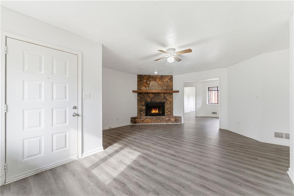 2130 Fieldstone View Court Southeast, Unit B Conyers, GA 30013 - Photo 2 of 18 a view of livingroom with hardwood floor and a ceiling fan
